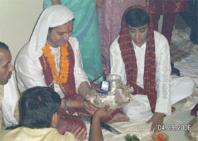 A Bihari Engagement: the brother gives a set of silverware and a 'ring'.